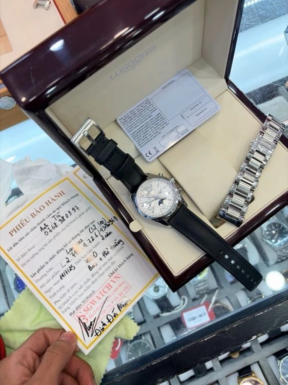 Ảnh giao dịch thực tế đồng hồ Longines Master Collection kèm phiếu bảo hành SG Watch